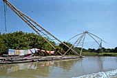 Along the Stung Sangker river, from Siem Reap to Battambang - fishing net of early Chinese design, with a counterweighted beam used for raising and lowering the net.